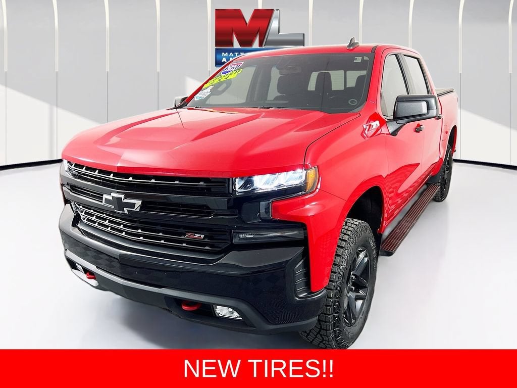 2021 Chevrolet Silverado 1500 LT Trail Boss in Red Hot — front three-quarter view